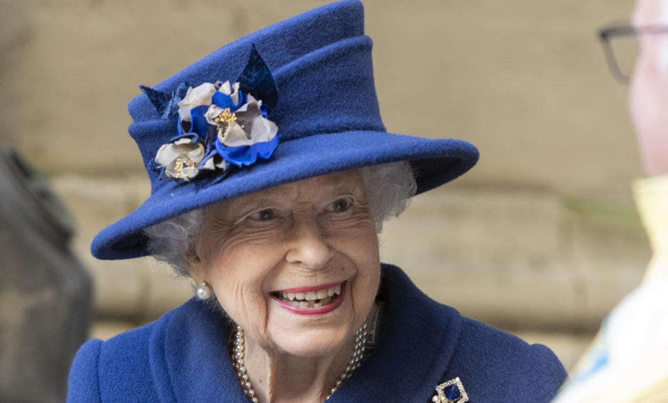 The Queen wearing blue