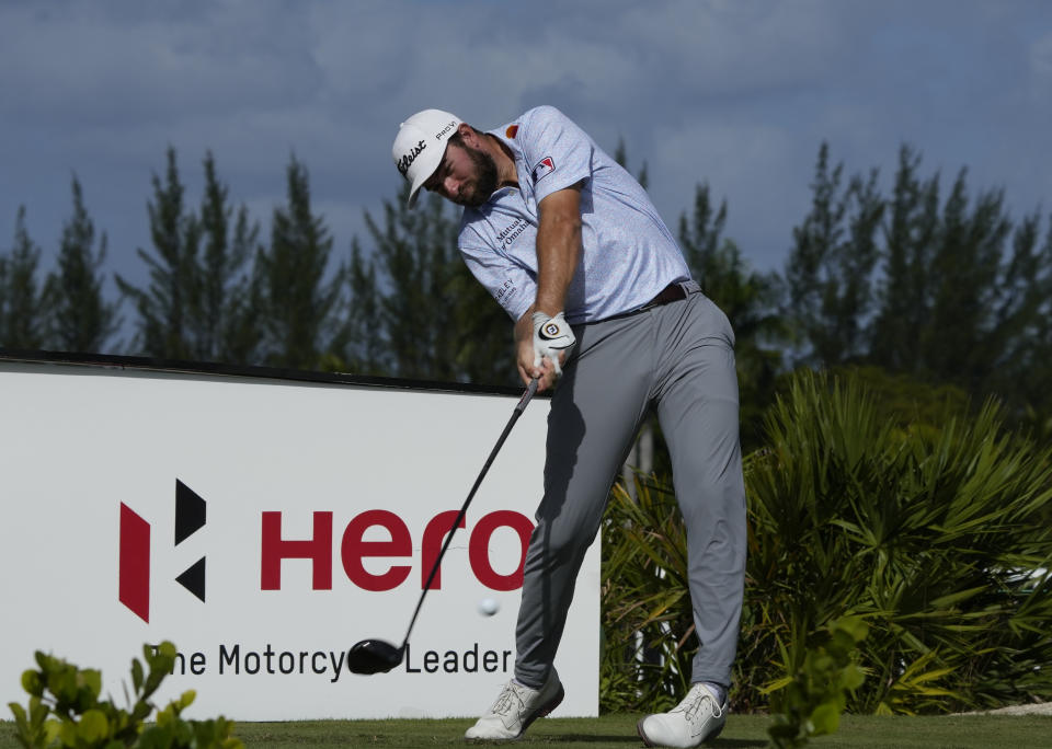 Cameron Young, of the United States, tees off on the fourth tee during the final round of the Hero World Challenge PGA Tour at the Albany Golf Club in New Providence, Bahamas, Sunday, Dec. 4, 2022. (AP Photo/Fernando Llano)