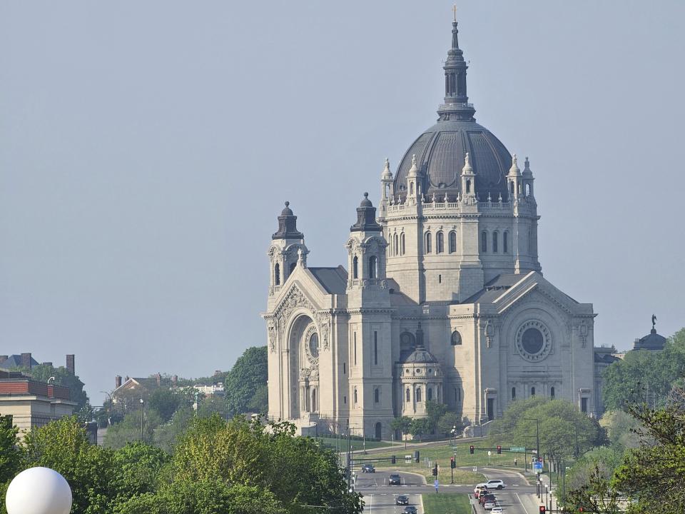 A smoky haze from Canadian wildfires hangs over downtown St. Paul, Minn. on Monday, May 13, 2024. The smoke pushed air quality to unhealthy levels in parts of Minnesota and Wisconsin. (AP Photo/Steve Karnowski)