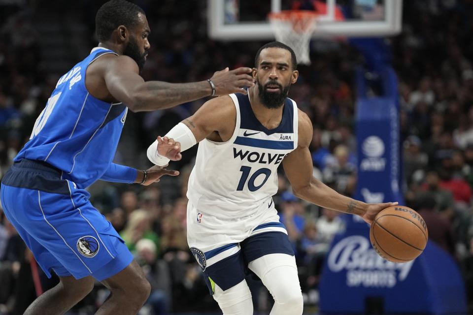 Minnesota guard Mike Conley dribbles against Dallas Mavericks in Dallas, Thursday, Dec. 14, 2023. The former Jazz guard has made a big impact for the upstart Timberwolves. | LM Otero, Associated Press