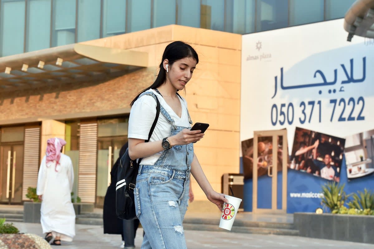 Saudi activist and fitness instructor Manahel al-Otaibi walks in western clothes (AFP via Getty Images)