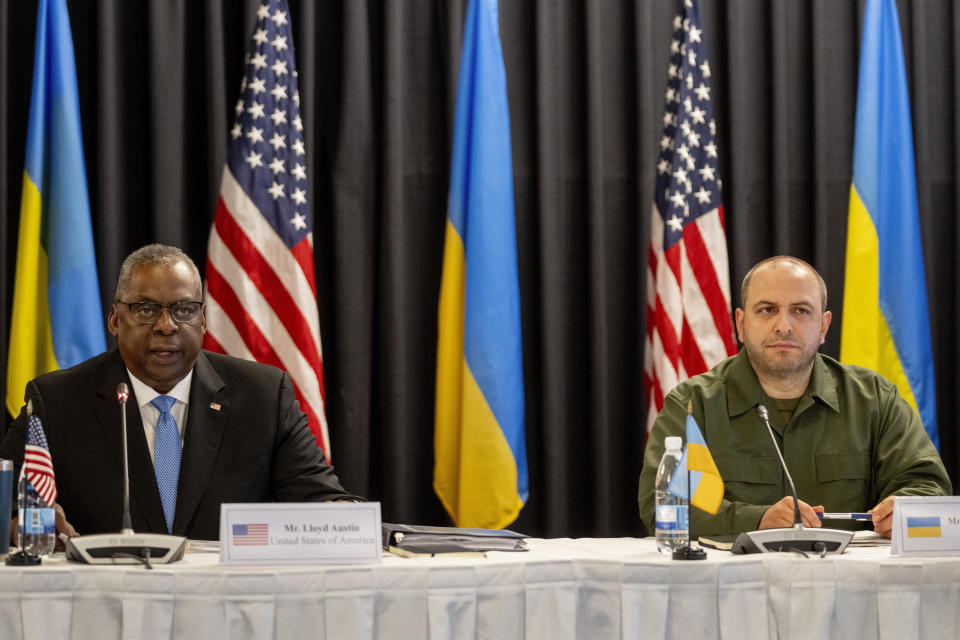 US Defense Secretary Lloyd Austin, left, and Rustem Umerov, Ukraine's Defense Minister attend the meeting of the 'Ukraine Defense Contact Group' at Ramstein Air Base in Ramstein, Germany, Tuesday, Sept. 19, 2023. Austin urged allied defense leaders Tuesday to “dig deep" and provide more air defense systems for Ukraine, to help the country block increasing barrages of Russian missiles. (AP Photo/Michael Probst)