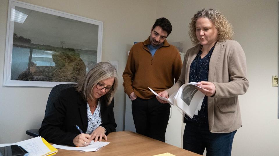 Tammy Rose, general manager of infrastructure and water services at the city of Ottawa,   with employees Dylan Samuel and Lisa Petch. 