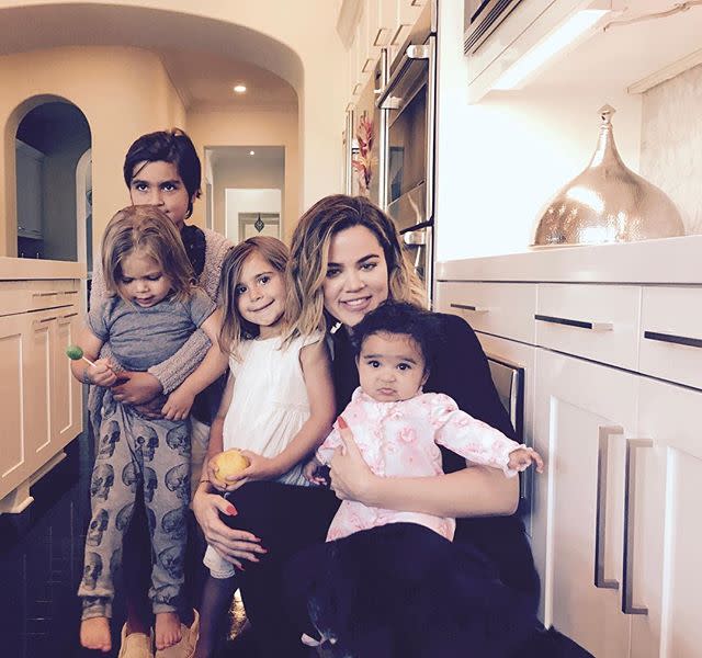 25) Khloe Kardashian with Mason, Reign, Penelope and Dream