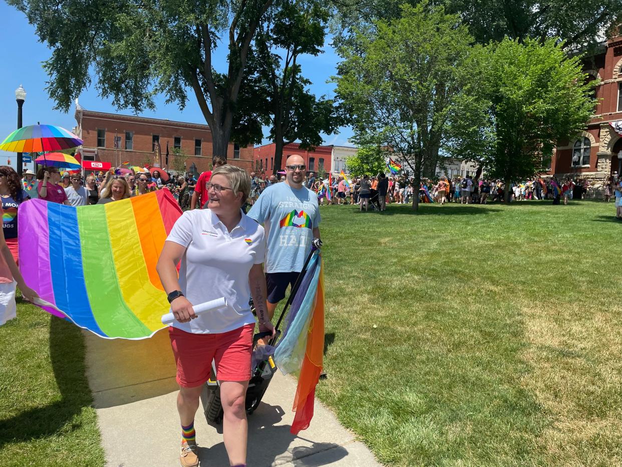 Maureen Elliott of the Pride Alliance of Livingston leads Howell's first-ever Pride Parade on Sunday, June 20, 2021.