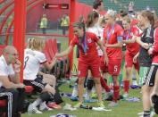 Jul 4, 2015; Edmonton, Alberta, CAN; England midfielder Fara Williams (4) shakes hands with Germany defender Saskia Bartusiak (3) on the bench at the end of their third place match of the FIFA 2015 Women's World Cup at Commonwealth Stadium. England defeated Germany 1-0 in extra time. Erich Schlegel-USA TODAY Sports