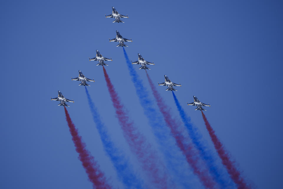 South Korean Air Force's Black Eagles aerobatic team performs during the first day of the Singapore Airshow in Singapore, Tuesday, Feb. 20, 2024. (AP Photo/Vincent Thian)