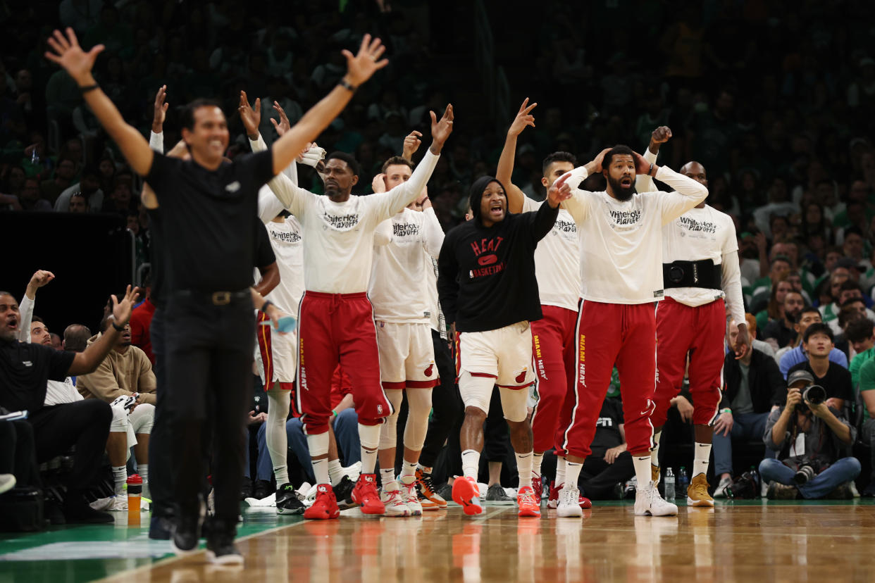 Members of Miami Heat bench react against the Boston Celtics during Game 6 of the Eastern Conference final on May 27, 2022 at TD Garden in Boston. The Heat won to force Game 7 back in Miami. (Maddie Meyer/Getty Images)