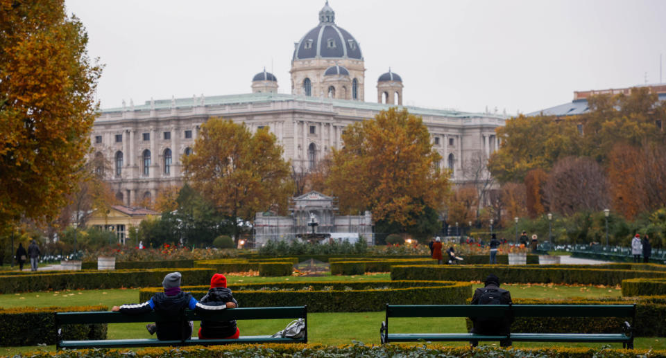 People sit in a public garden amidst the coronavirus disease (COVID-19) outbreak, as Austria's government imposes a lockdown on people who are not fully vaccinated, in Vienna, Austria November 14, 2021. Source: Reuters