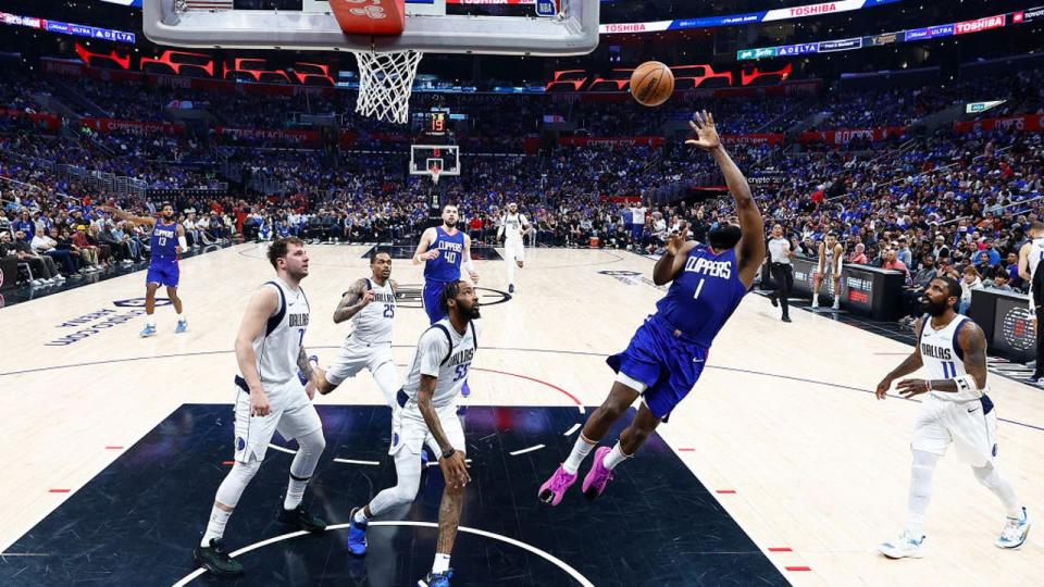 <div>James Harden #1 of the LA Clippers takes a shot against the Dallas Mavericks in the second half during game one of the Western Conference First Round Playoffs at Crypto.com Arena on April 21, 2024 in Los Angeles, California. (Photo by Ronald Martinez/Getty Images)</div> <strong>(Getty Images)</strong>