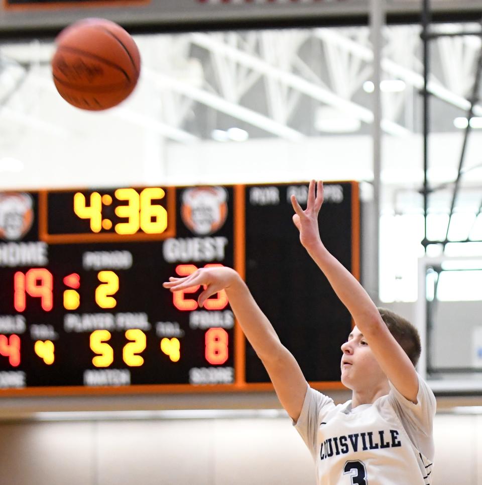 Louisville's Beau Siegfried shoots a 3-pointer in the second quarter of the Leopards' 65-50 win vs. Woodridge at the Spectrum Orthopaedics Classic at North Canton Hoover High School on Saturday, Jan. 15, 2022.