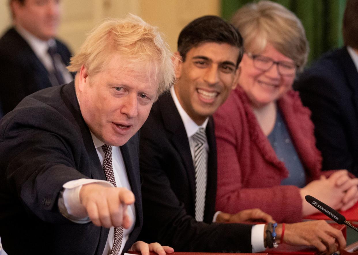 Britain's Prime Minister Boris Johnson speaks during his first Cabinet meeting next to a new appointed Chancellor of the Exchequer Rishi Sunak, following a reshuffle the day before, at Downing Street in London, Britain February 14, 2020. Matt Dunham/Pool via REUTERS