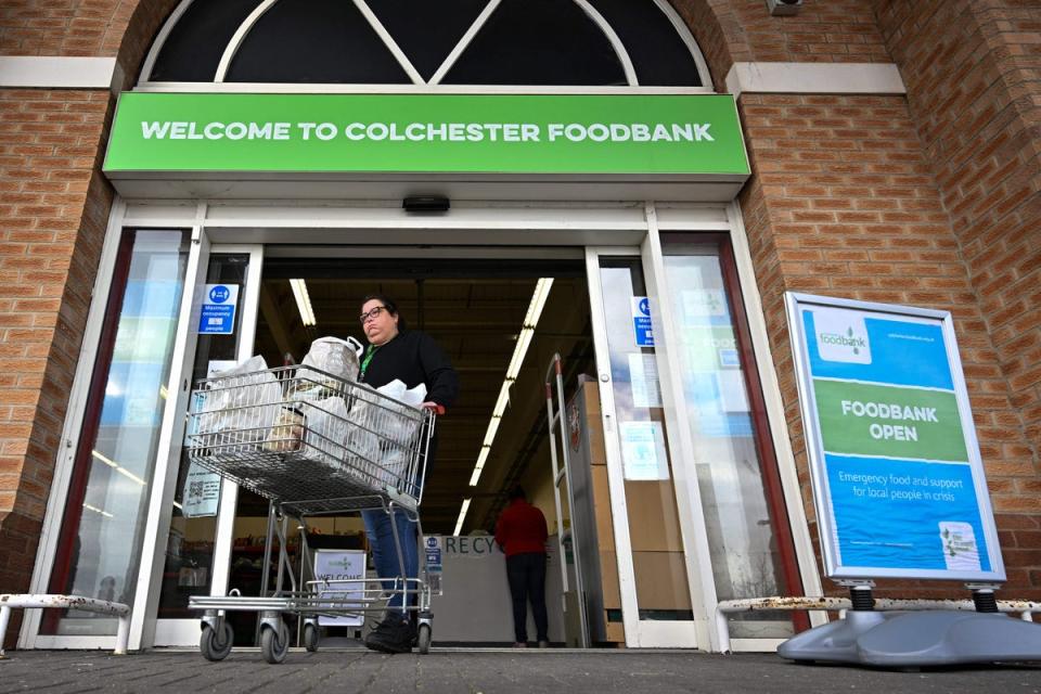 Emma Revie, chief executive of the Trust, said food banks should not be allowed to ‘become the new norm’ (AFP via Getty Images)