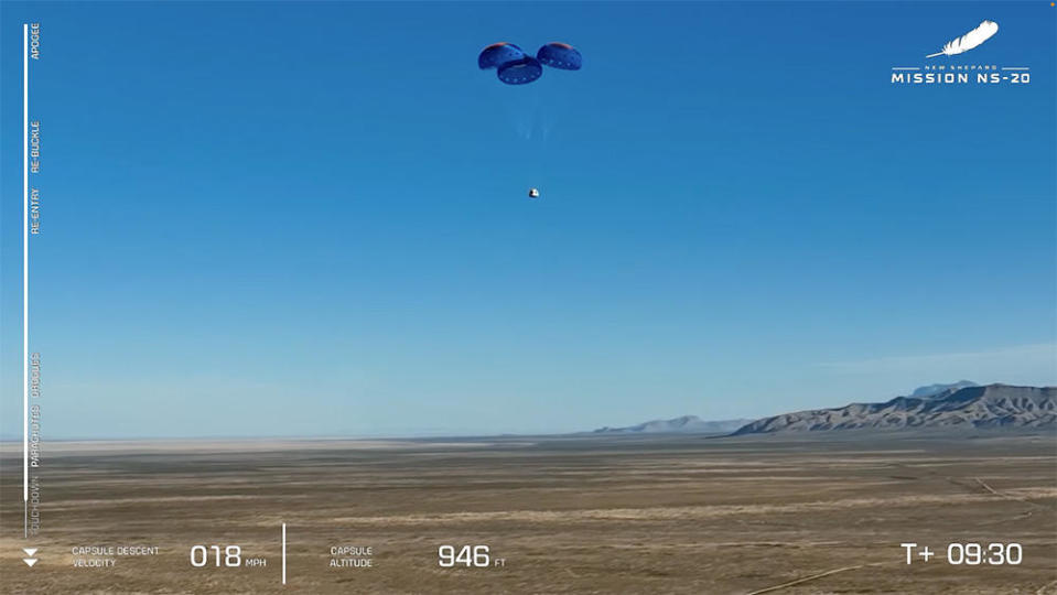 The crew capsule descends toward landing in West Texas after reaching a maximum altitude of 65.9 miles, about four miles higher than the internationally recognized 