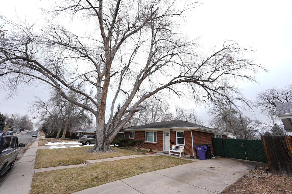 The residence where a former funeral home owner kept a deceased women's body in a hearse for two years as well as the remains of 30 cremated people is shown Friday, Feb. 16, 2024, in southwest Denver. The discovery occurred on Feb. 6 during a court-ordered eviction of the home rented by 33-year-old Miles Harford, who authorities have issued an arrest warrant for. (AP Photo/David Zalubowski)