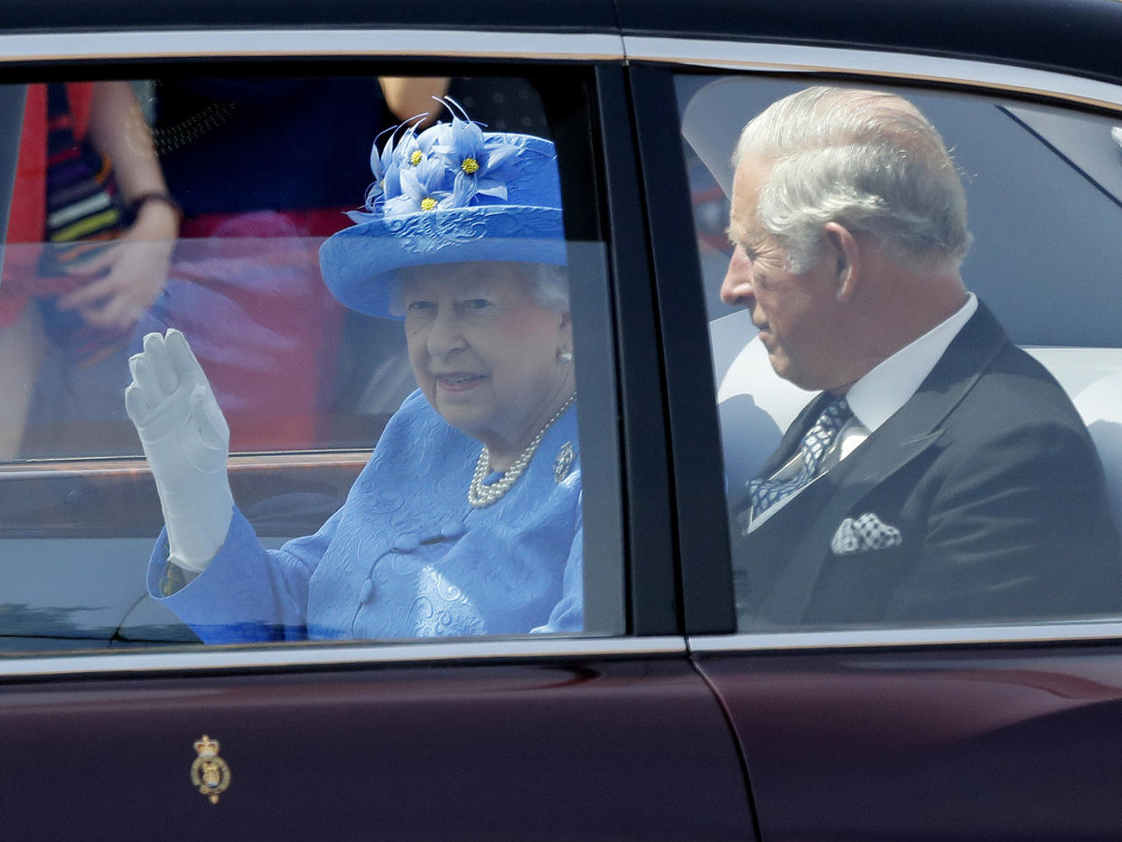 The Queen leaves Buckingham Palace with Prince Charles to travel Parliament for her speech: AP Photo/Frank Augstein