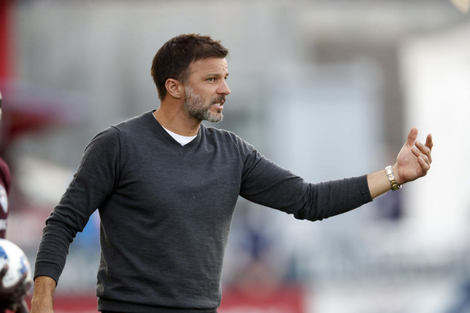 FILE - Colorado Rapids head coach Anthony Hudson gestures in the second half of an MLS soccer match Sunday, Oct. 28, 2018, in Commerce City, Colo. Anthony Hudson will coach the United States men's soccer team rather than Gregg Berhalter ahead of the first two matches of the cycle leading to the 2026 World Cup. (AP Photo/David Zalubowski, File)