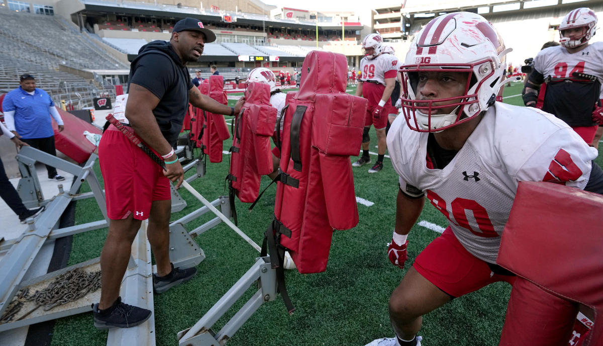 Report: Former Wisconsin DL coach Greg Scruggs reports to work at Big Ten  rival - Yahoo Sports