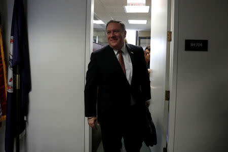 FILE PHOTO: CIA Director Mike Pompeo, President Donald Trump's nominee to be Secretary of State, leaves a meeting with Sen. Mark Warner (D-VA) on Capitol Hill in Washington, U.S., April 18, 2018. REUTERS/Aaron P. Bernstein