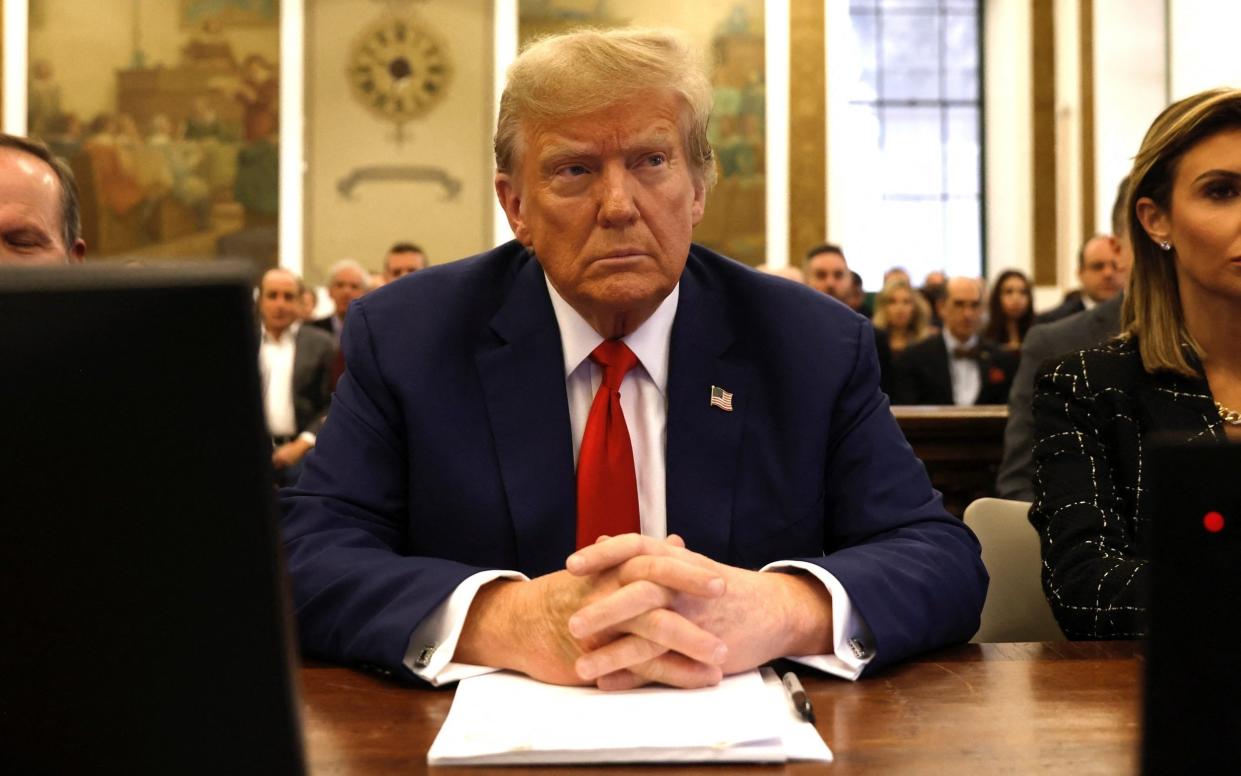 Donald Trump sits in New York State Supreme Court during the civil fraud trial against the Trump Organization in January 2024.