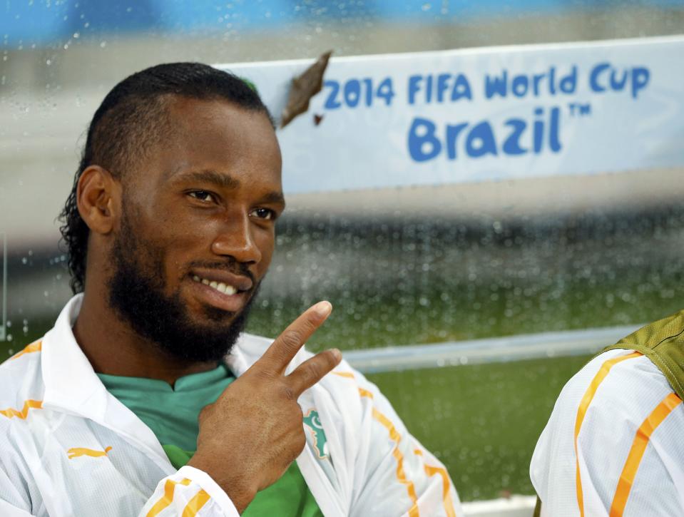 Ivory Coast's Didier Drogba gestures before the 2014 World Cup Group C soccer match between Ivory Coast and Japan at the Pernambuco arena in Recife June 14, 2014. REUTERS/Yves Herman