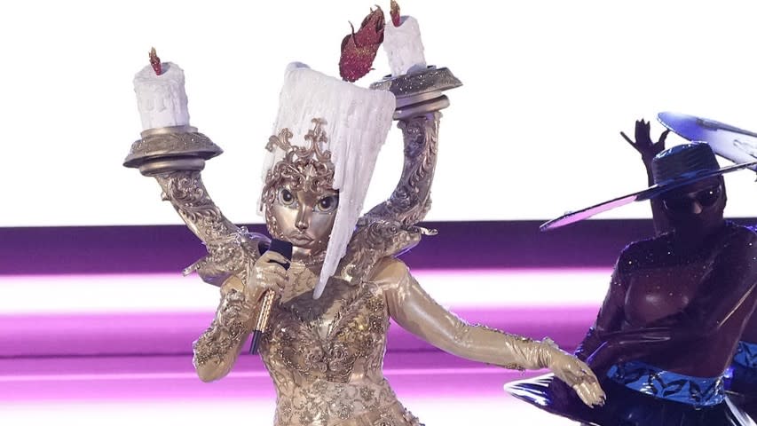  Candelabra performs during One-Hit Wonders Night on The Masked Singer season 10. 