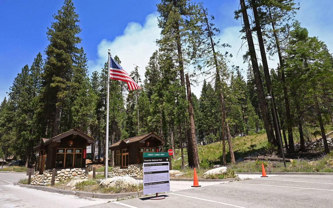 The South Gate entrance is closed as the Washburn Fire burns in the distance at Yosemite National Park Monday afternoon, July 11, 2022 near Oakhurst.