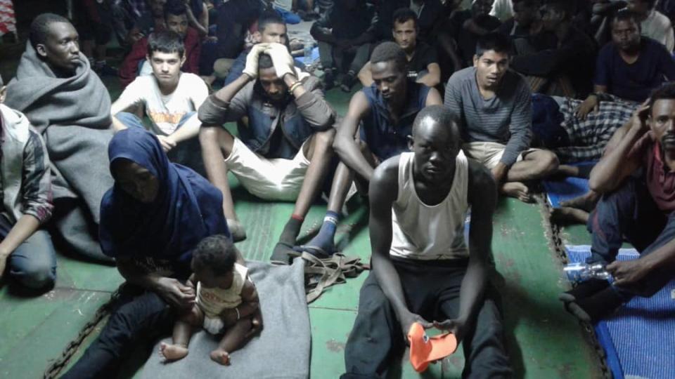 NIn this photo provided Nov. 14, 2018, migrants on board the container ship Nivin are refusing to disembark in Misrata, Libya. A total of 91 migrants, including a baby, were rescued by the ship’s crew last weekend after leaving Libya in a raft. (AP Photo)