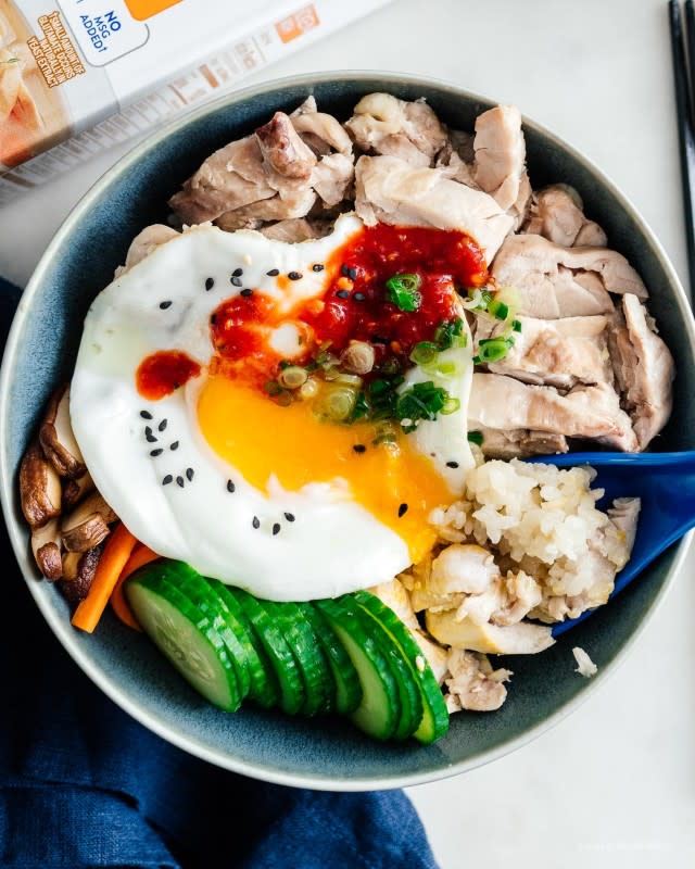 <p>I am a Food Blog</p><p>A surprisingly easy take on Hainanese chicken rice.</p><p><strong>Get the recipe: <a href="https://iamafoodblog.com/one-pot-hainanese-chicken-bibimbap-rice-bowl/" rel="nofollow noopener" target="_blank" data-ylk="slk:One-Pot Hainanese Chicken Bibimbap Rice Bowl;elm:context_link;itc:0;sec:content-canvas" class="link ">One-Pot Hainanese Chicken Bibimbap Rice Bowl</a></strong></p>