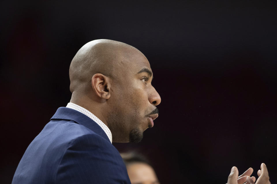 FILE - Nebraska associate head coach Chuck Love instructs players from the sideline during the first half of an NCAA college basketball game against Indiana, Feb. 14, 2022, in Lincoln, Neb. Love, in his answer to a civil lawsuit filed in February by former Nebraska player Ashley Scoggin, denied having a sexual relationship with Scoggin. (AP Photo/Rebecca S. Gratz, file)