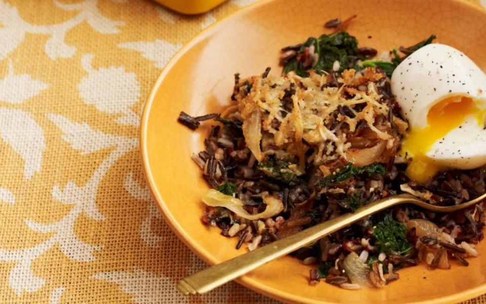 Baked wild rice with kale, carmelized onions, and soft-cooked eggs<p>Andrew Purcell</p>