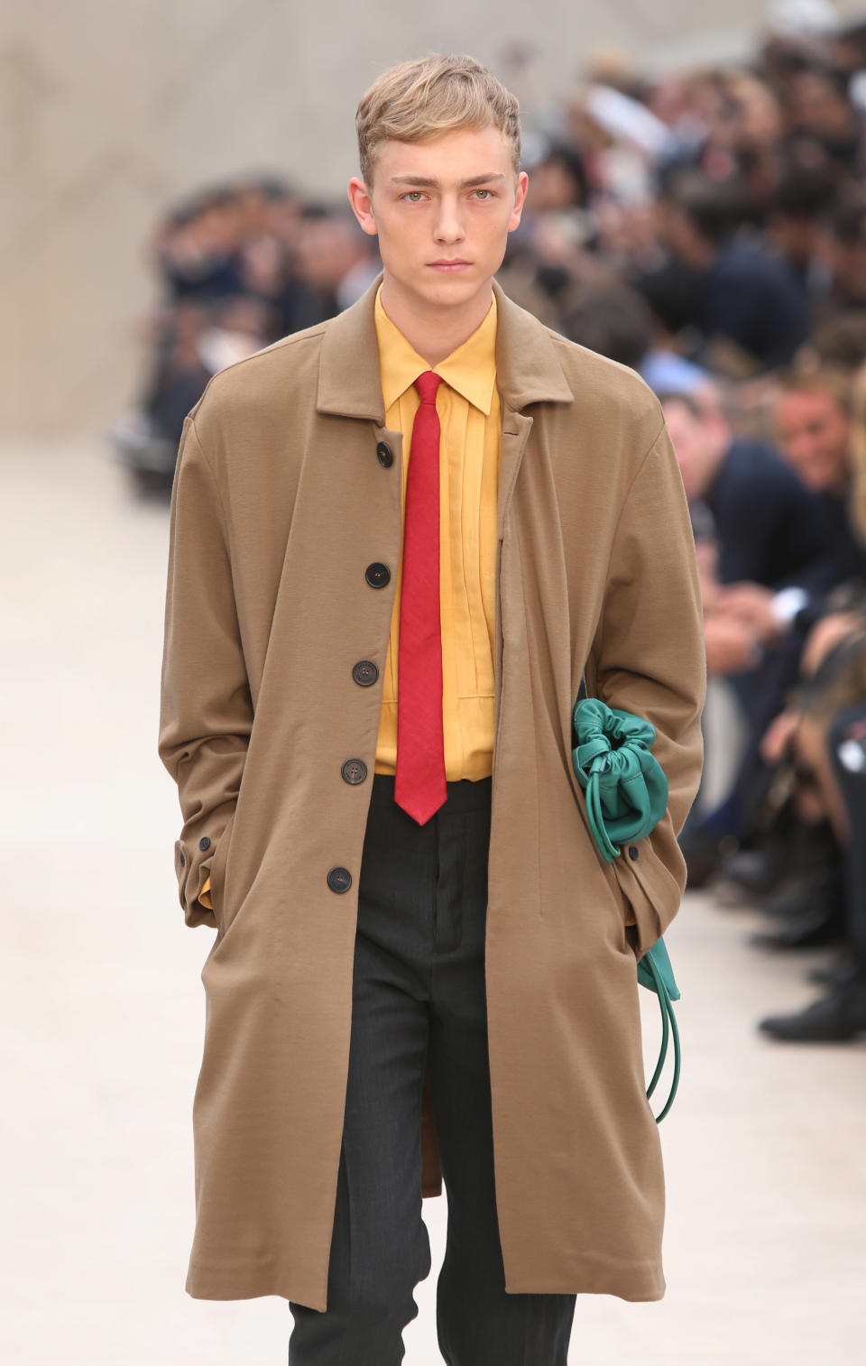 A model wears a creation by Burberry during London Men's spring summer fashion collections 2014, in London, Tuesday, June 18, 2013. (Photo by Joel Ryan/Invision/AP)