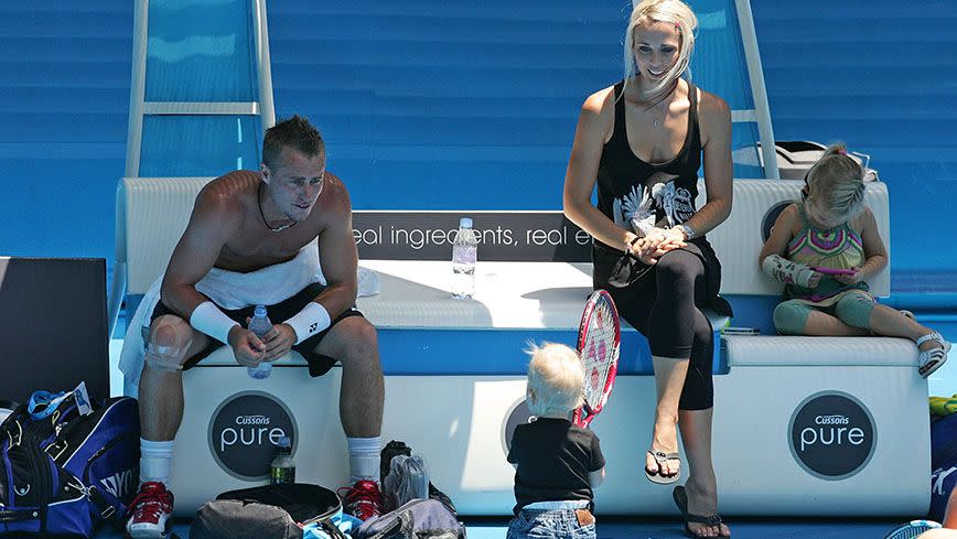 Bec and Lleyton play with their children on court. Source: Getty