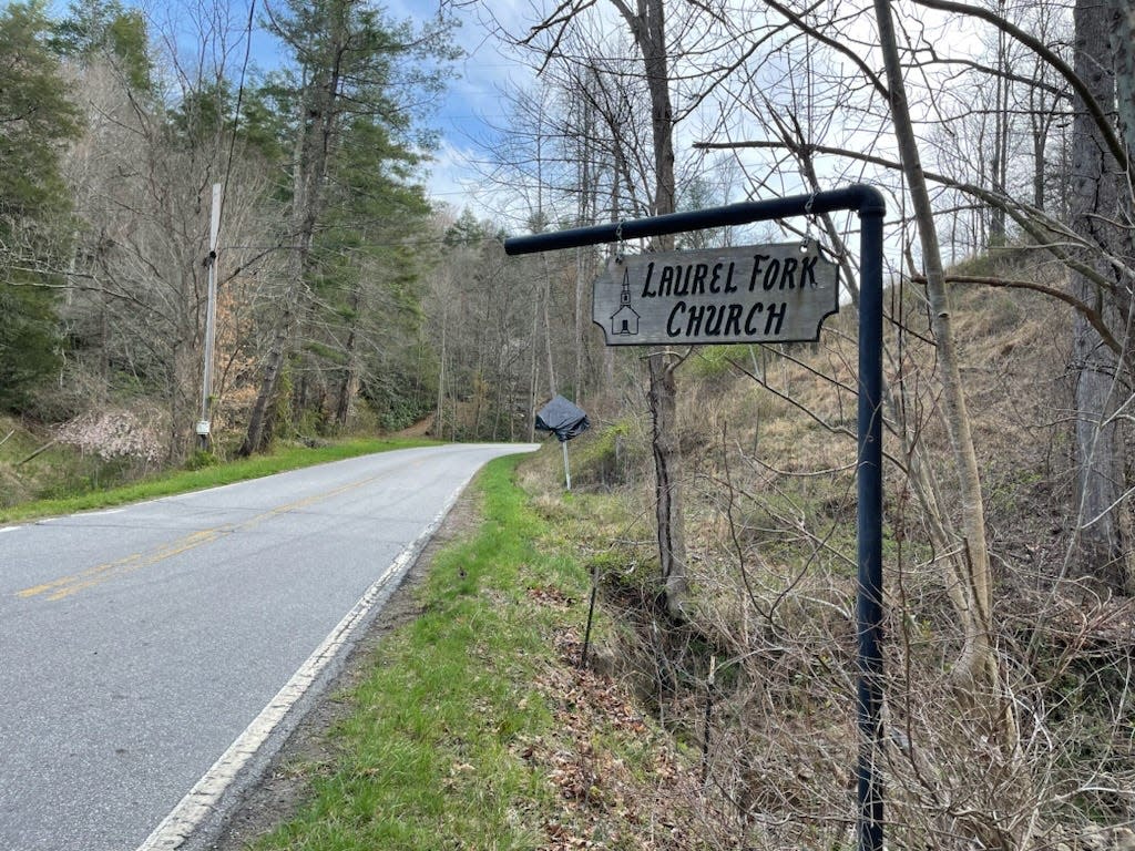 Community members affiliated with Laurel Fork Church in Marshall expressed concerns about a proposed meditation retreat center, including increased traffic and noise.