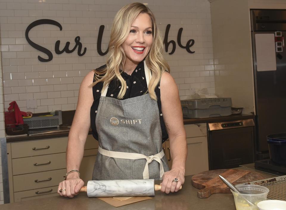 Jennie Garth gets cooking on Tuesday at an event in N.Y.C. marking a new partnership between same-day delivery service Shipt and Sur La Table.