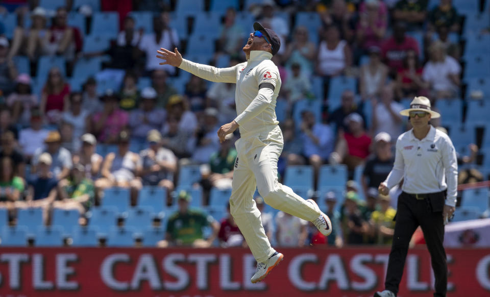 England's Jonny Bairstow reacts after taking a catch to dismiss South Africa's batsman Aiden Markram for 20 runs on day one of the first cricket test match between South Africa and England at Centurion Park, Pretoria, South Africa, Thursday, Dec. 26, 2019. (AP Photo/Themba Hadebe)