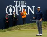 USA's Jordan Spieth celebrates after holing a putt on the 18th green to win The Open Championship REUTERS/Andrew Boyers