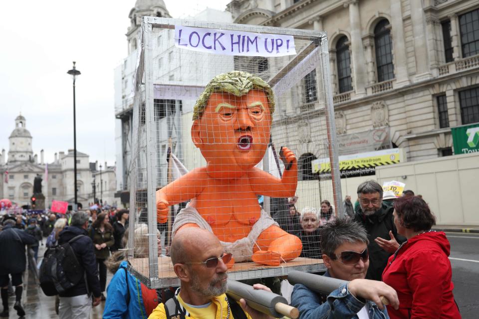 Protesters take part in a demonstration against the State Visit of President Donald Trump in central London on June 4, 2019.