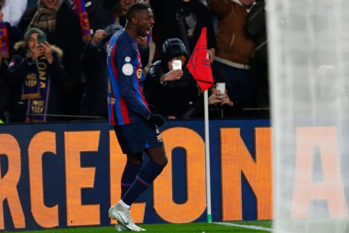 Ousmane Dembele celebrates after scoring in Barcelona’s win over Real Sociedad (AP/Joan Monfort) (AP)