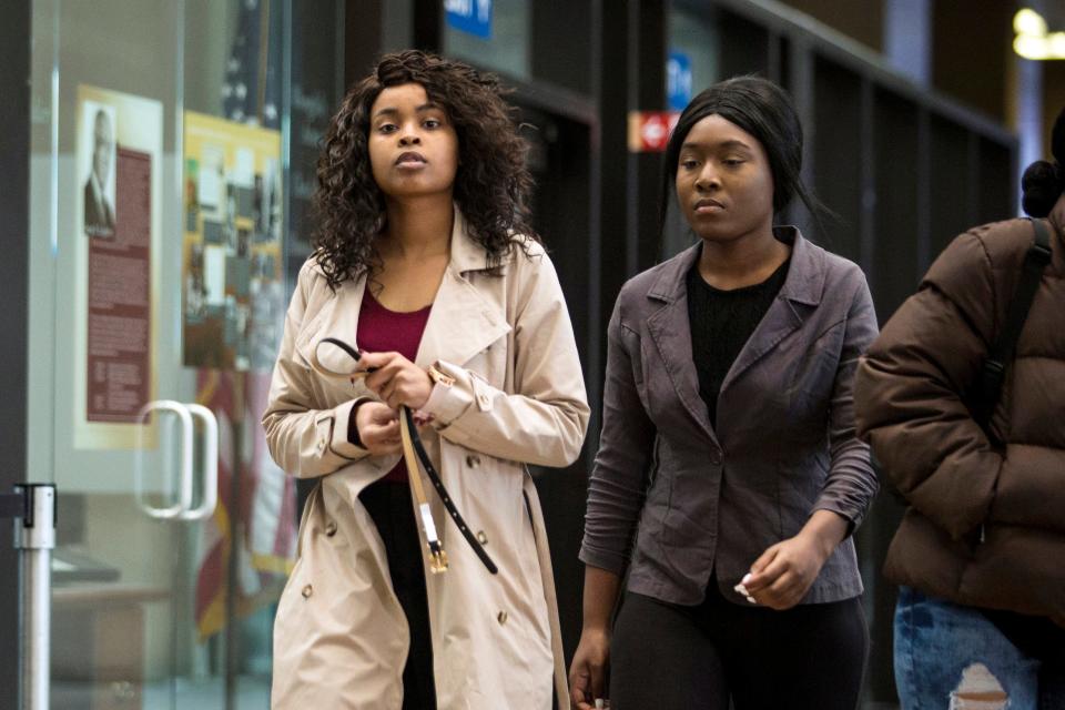 R. Kelly accuser Jerhonda Pace, left, outside the courthouse in Chicago on Feb. 23, 2019, for a hearing in the state sex-crimes case against the R&B star.