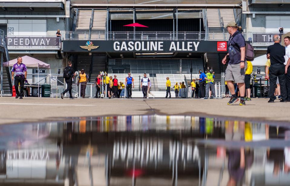 Fans, IndyCar team members and others make their way through Gasoline Alley on Friday, May 20, 2022, prior to Fast Friday practice in preparation for the 106th running of the Indianapolis 500 at Indianapolis Motor Speedway. 