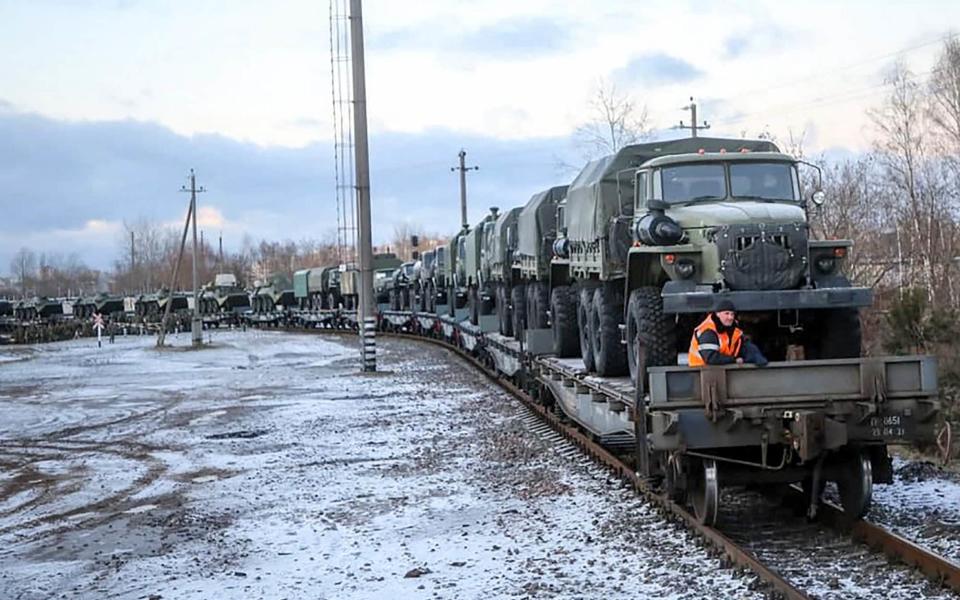 Russian troop train transporting military vehicles arriving for drills in Belarus - AFP