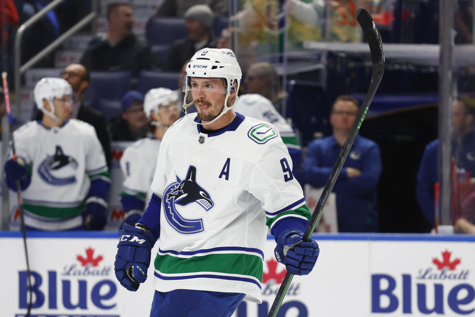 Vancouver Canucks center J.T. Miller (9) celebrates his goal during the second period of an NHL hockey game against the Buffalo Sabres, Tuesday, Nov. 15, 2022, in Buffalo, N.Y. (AP Photo/Jeffrey T. Barnes)
