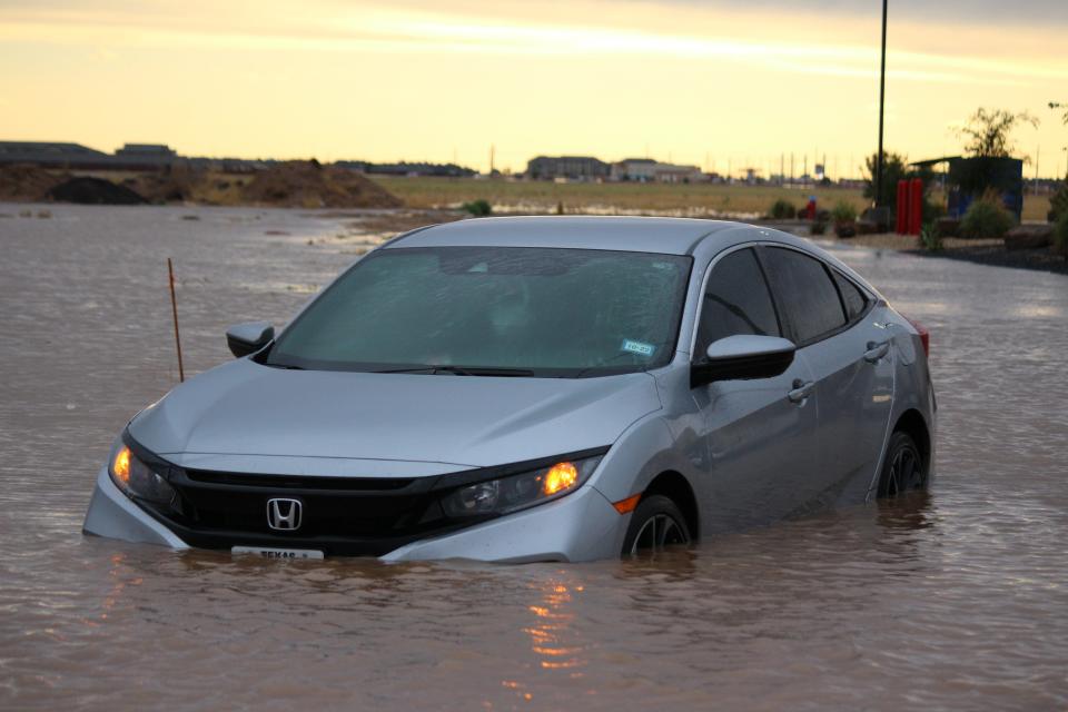 A vehicle was stalled out in water Tuesday evening in the Lubbock-Cooper area.