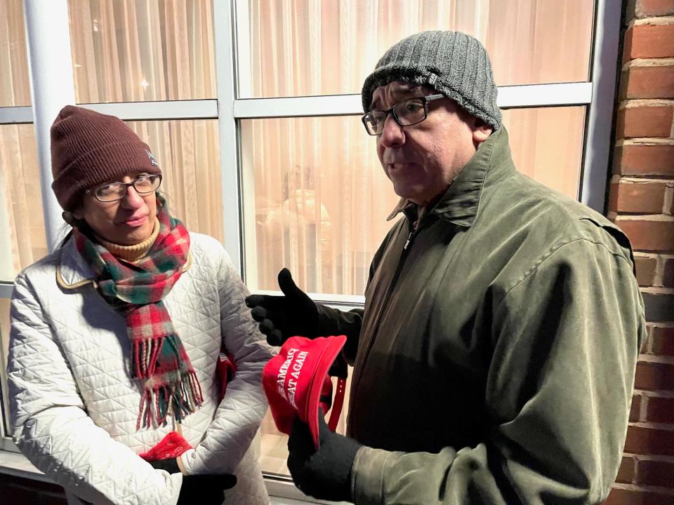 Patricia and Bill Trujillo of Lee talk about their support for Donald Trump as they wait in freezing weather to see him speak in Portsmouth Wednesday, Jan. 17, 2024.