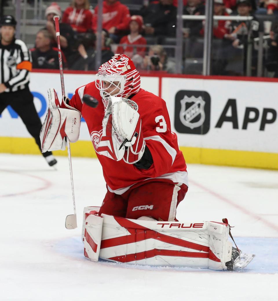 Detroit Red Wings goaltender Ville Husso (35) makes a save against the Montreal Canadiens during second period action at Little Caesars Arena Friday, October 14, 2022.