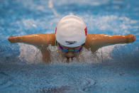 FILE - In this Aug. 26, 2021, file photo, Daomin Liu competes at Women's 200m Individual Medley - SM6 Heat 1 at the Tokyo Aquatics Centre during the Tokyo 2020 Paralympic Game in Tokyo, Japan. There are 4,403 Paralympic athletes competing in Tokyo, each with unique differences that have to be classified. Lines have to be draw, in the quest for fairness, to group similar impairments, or impairments that yield similar results. (AP Photo/Emilio Morenatti, File)