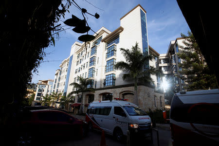 FILE PHOTO: An ambulance is seen at the scene where explosions and gunshots were heard at the Dusit hotel compound, in Nairobi, Kenya January 15, 2019. REUTERS/Thomas Mukoya/File Photo