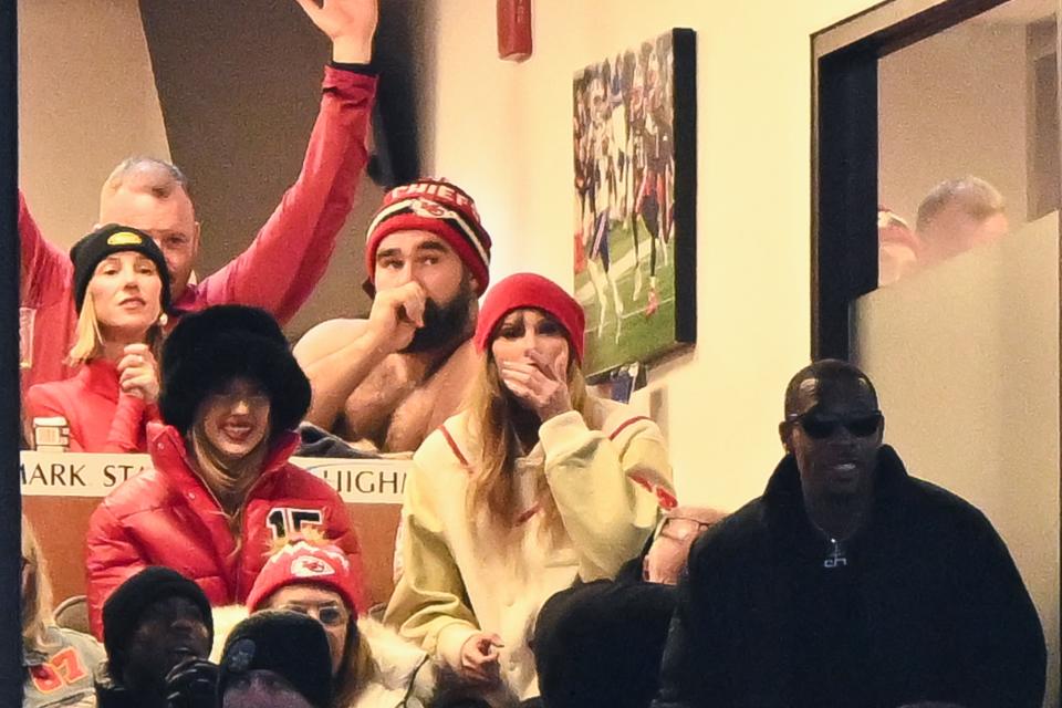 Swift and a shirtless Jason Kelce watching Sunday’s game with Brittany Mahomes.