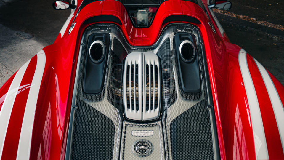 An exterior detail of the engine bay of a 2015 Porsche 918 "Weissach" Spyder.